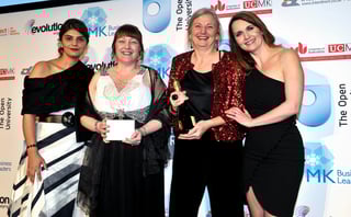 Bucks Biz clients Jeanius Consulting collect their award.