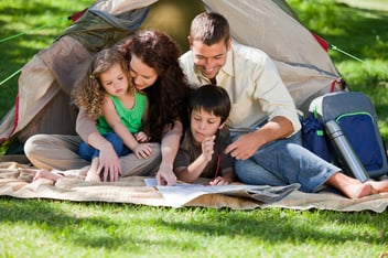 Joyful family camping